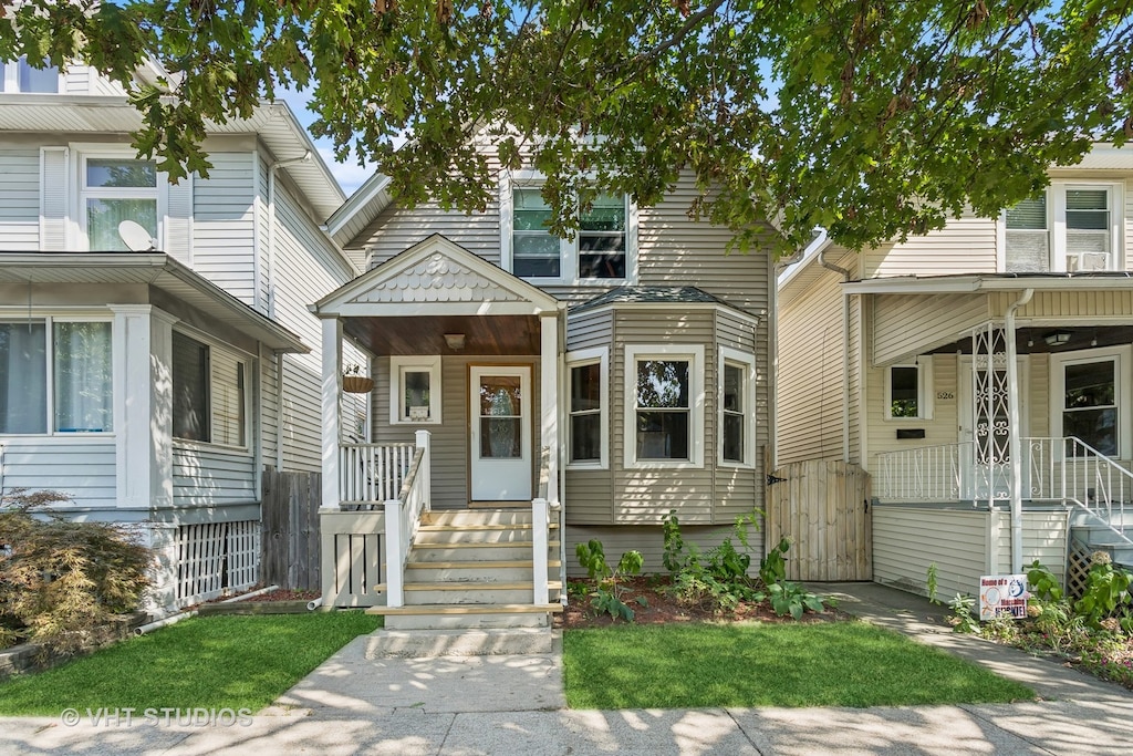 view of front of home featuring covered porch