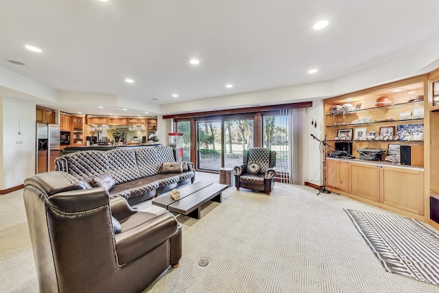 living room with light colored carpet