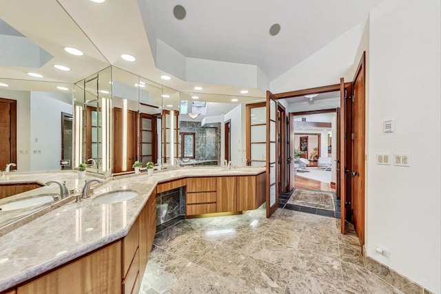 132 N Wynstone Dr, North Barrington, IL 60010 - full bathroom with recessed lighting, double vanity, lofted ceiling, a walk in shower, and baseboards
