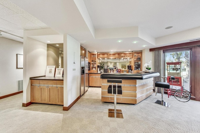 132 N Wynstone Dr, North Barrington, IL 60010 - kitchen featuring stainless steel refrigerator with ice dispenser, light carpet, baseboards, and recessed lighting