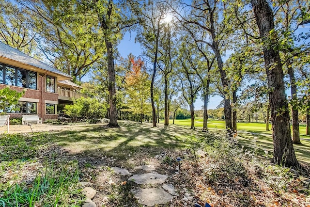 132 N Wynstone Dr, North Barrington, IL 60010 - view of grassy yard with a deck