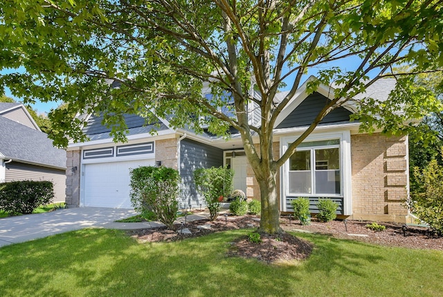 view of front facade with a front lawn and a garage