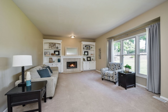 carpeted living room featuring a healthy amount of sunlight