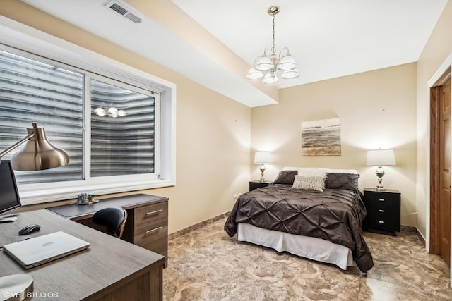 bedroom featuring a notable chandelier