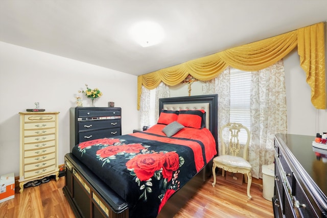 bedroom featuring wood-type flooring