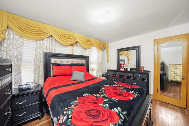 bedroom featuring hardwood / wood-style floors