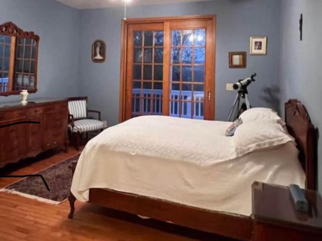 bedroom featuring hardwood / wood-style flooring