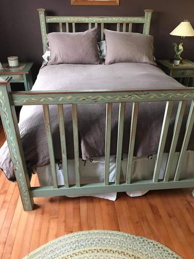 unfurnished bedroom featuring hardwood / wood-style floors