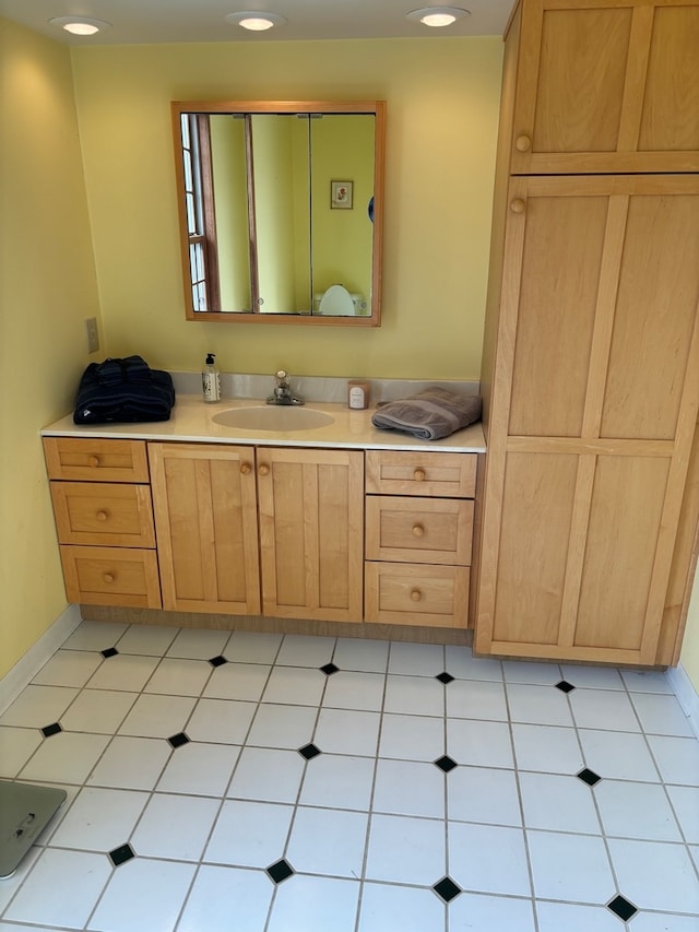 bathroom with vanity and tile patterned floors