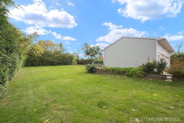 view of yard featuring a garage