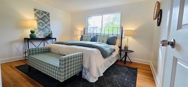 bedroom featuring hardwood / wood-style floors