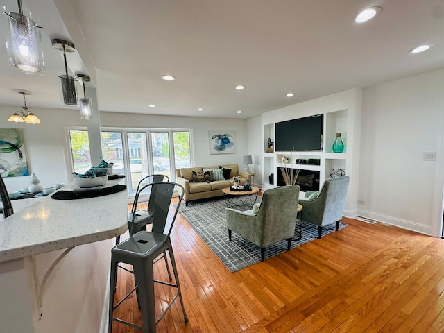 living room with light wood-type flooring