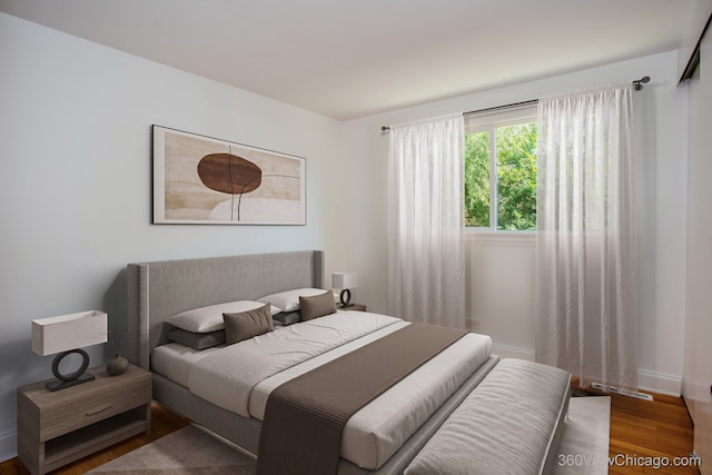 bedroom featuring hardwood / wood-style floors