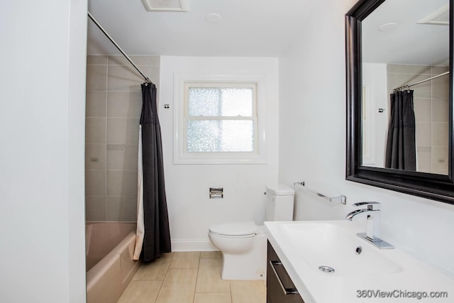 full bathroom featuring shower / tub combo with curtain, tile patterned floors, vanity, and toilet