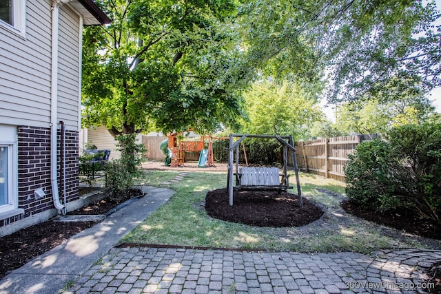 view of yard featuring a playground