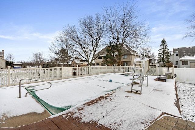 view of snow covered pool