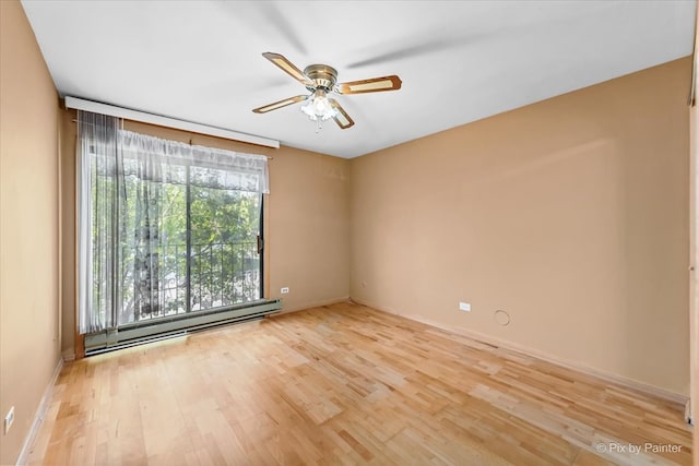 unfurnished room featuring ceiling fan, light hardwood / wood-style floors, and a baseboard heating unit