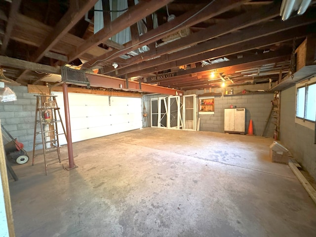 garage featuring concrete block wall