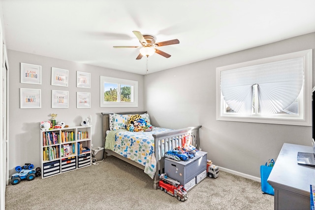 bedroom featuring ceiling fan and carpet flooring