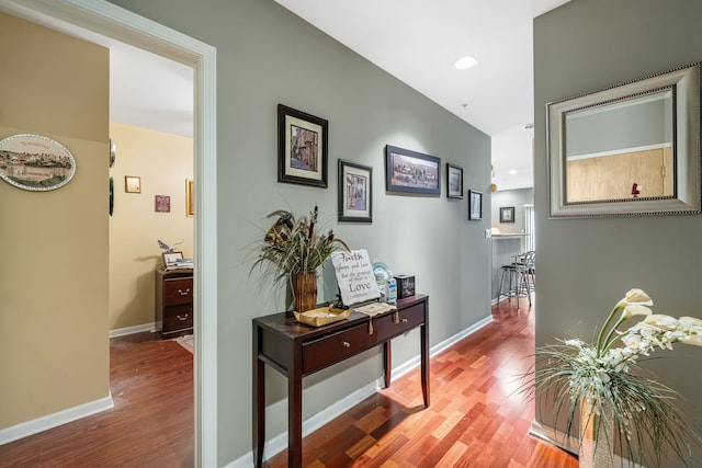 hallway featuring hardwood / wood-style flooring