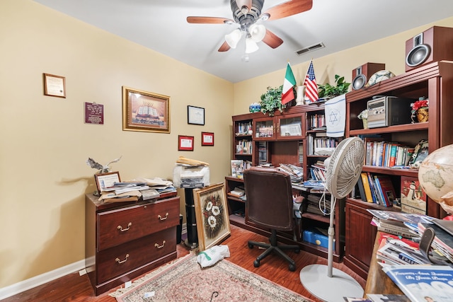 office area featuring ceiling fan and dark hardwood / wood-style flooring