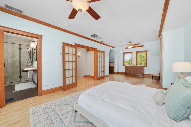 bedroom with french doors, ornamental molding, and hardwood / wood-style floors