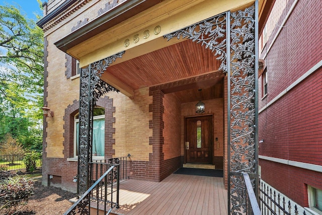 doorway to property with a deck