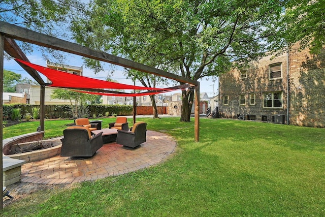 view of yard with cooling unit and a patio area