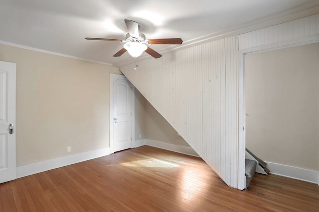 bonus room featuring vaulted ceiling, light hardwood / wood-style flooring, and ceiling fan