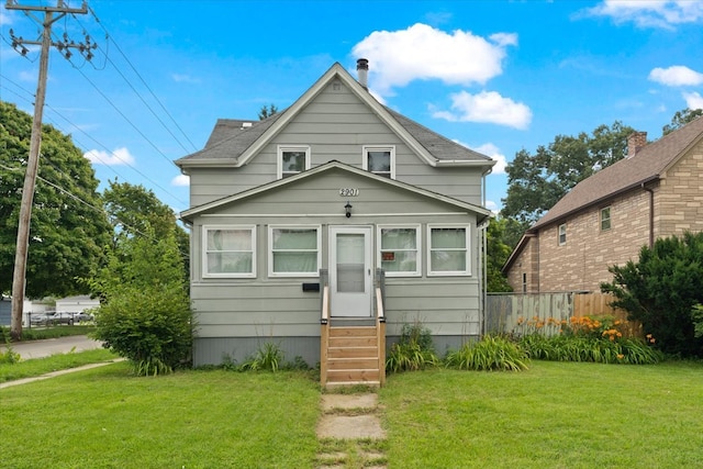 view of front of house with a front yard