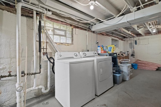 laundry room with washer and clothes dryer