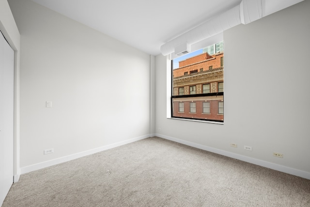 unfurnished room with carpet