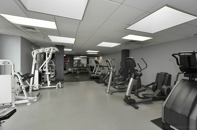 gym with a drop ceiling