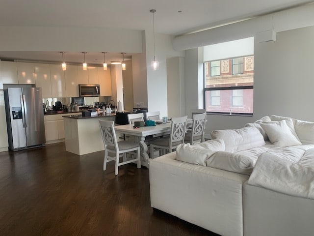 living room featuring dark hardwood / wood-style floors