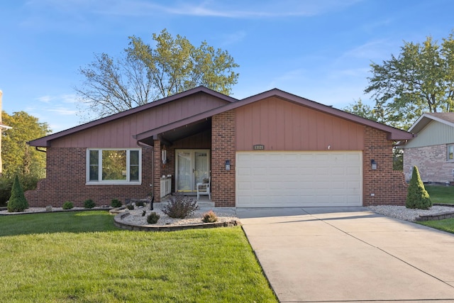 ranch-style home with a garage and a front lawn