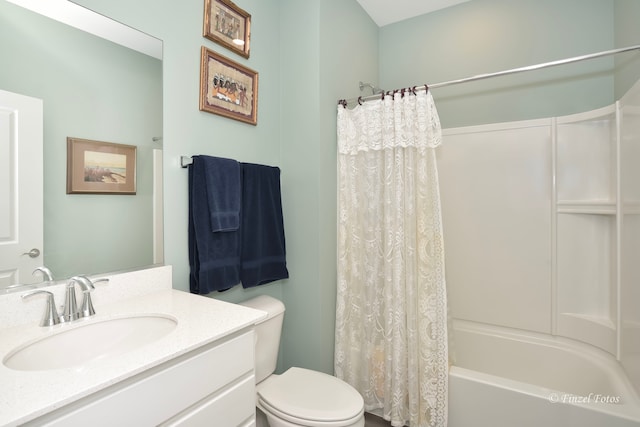 full bathroom with vanity, toilet, and shower / bath combo