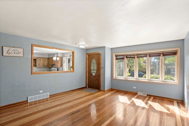 foyer featuring light wood-type flooring