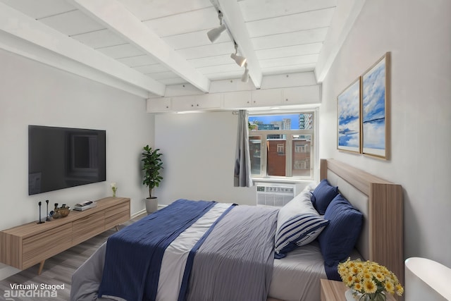 bedroom with rail lighting, a wall mounted AC, beam ceiling, wooden ceiling, and hardwood / wood-style floors