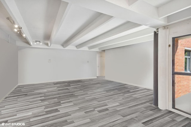 spare room with light wood-type flooring