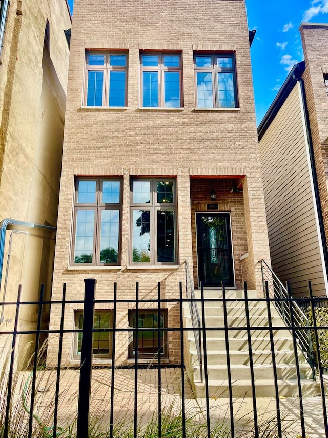 3407 S Calumet Ave, Chicago, IL 60616 - doorway to property featuring brick siding