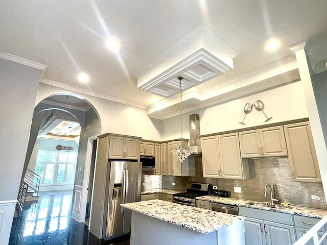 3407 S Calumet Ave, Chicago, IL 60616 - kitchen featuring appliances with stainless steel finishes, a kitchen island, ornamental molding, light stone counters, and backsplash