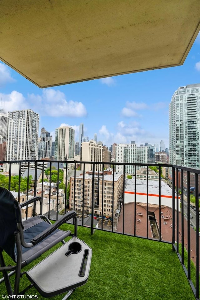 balcony featuring a city view