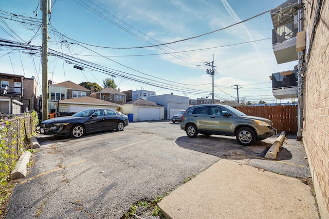 view of parking with a garage