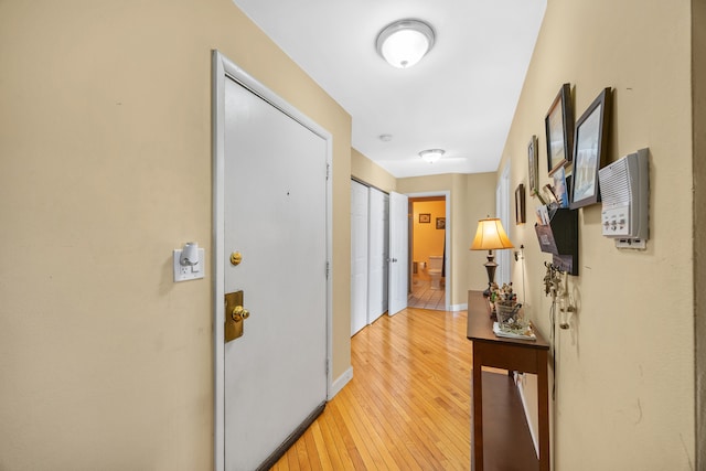 corridor featuring light hardwood / wood-style flooring