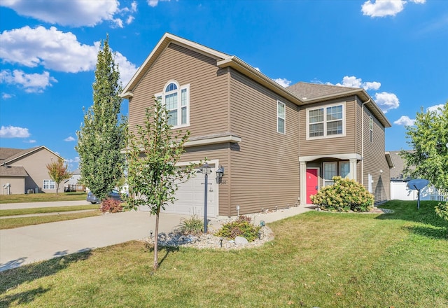 view of front property with a garage and a front lawn