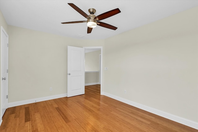 unfurnished bedroom featuring ceiling fan and light hardwood / wood-style flooring