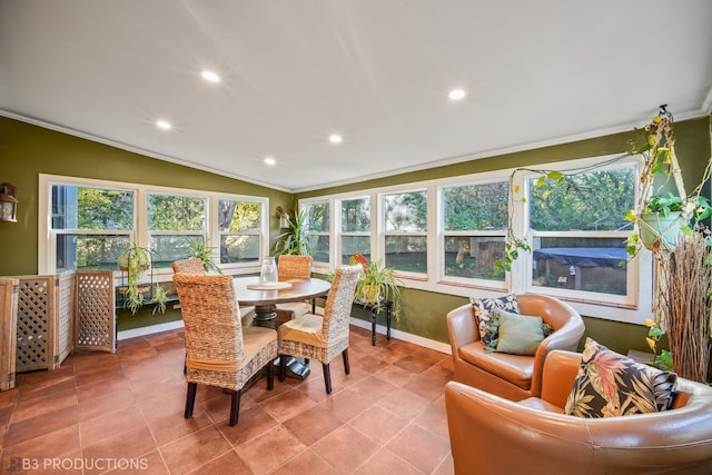 sunroom / solarium with vaulted ceiling