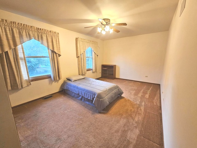 bedroom with carpet flooring and ceiling fan