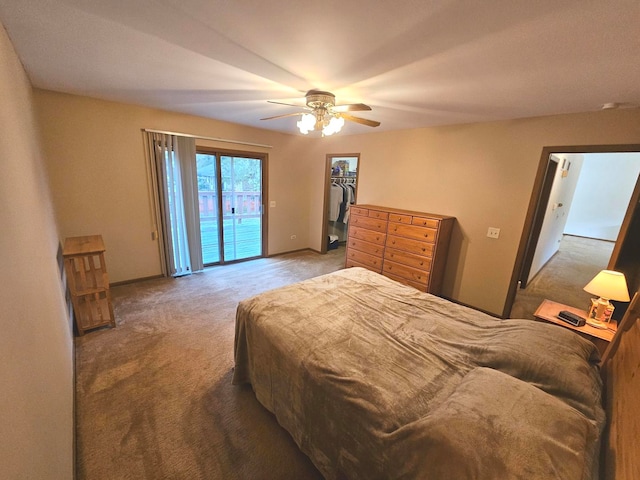 bedroom with carpet, ceiling fan, and access to outside