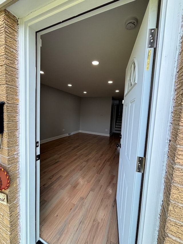 interior space with hardwood / wood-style floors